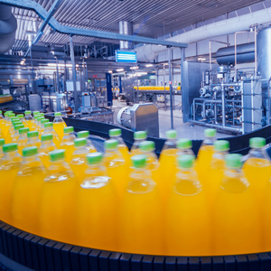 Orange sugary drinks at a factory
